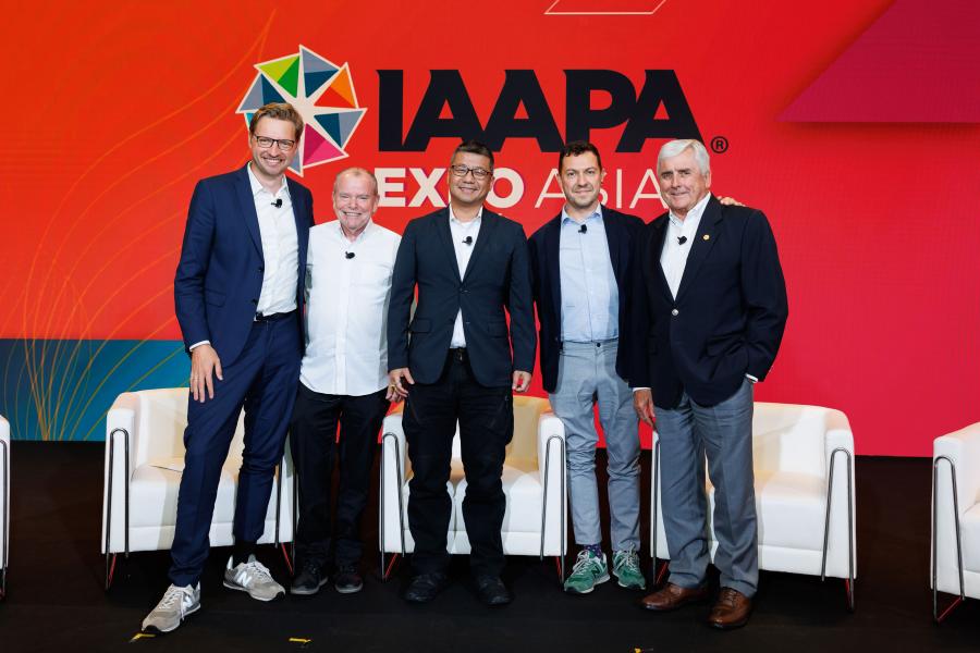 Portrait of several IAAPA leaders on stage in Singapore at IAAPA Expo Asia in June 2023
