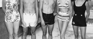 Young Tim O'Brien and friends pose in swimsuits 