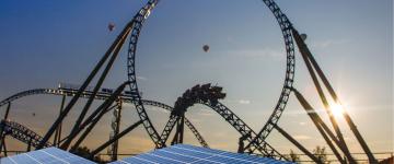 Solar panels at home in close view, next to a roller coaster in Europa-Park