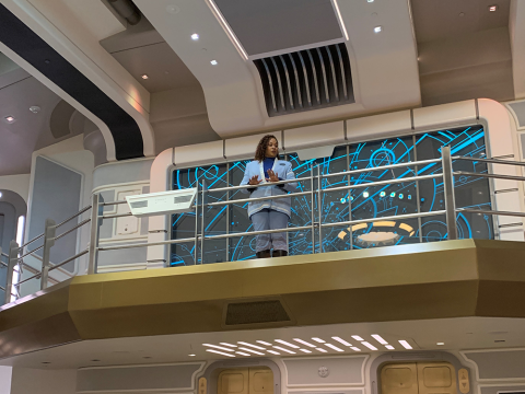 Cruise Director Lenka Mok welcomes passengers to the Halcyon starcruiser