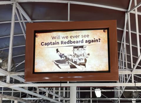 Legoland queue screen that reads, "Will we ever see Captain Redbeard again?"