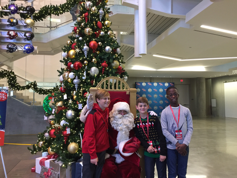Kids pose with santa