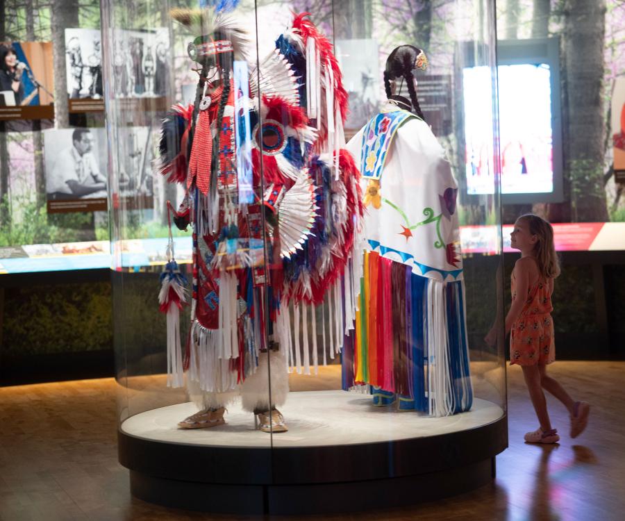 First Americans Museum exhibit displaying indigenous outfits