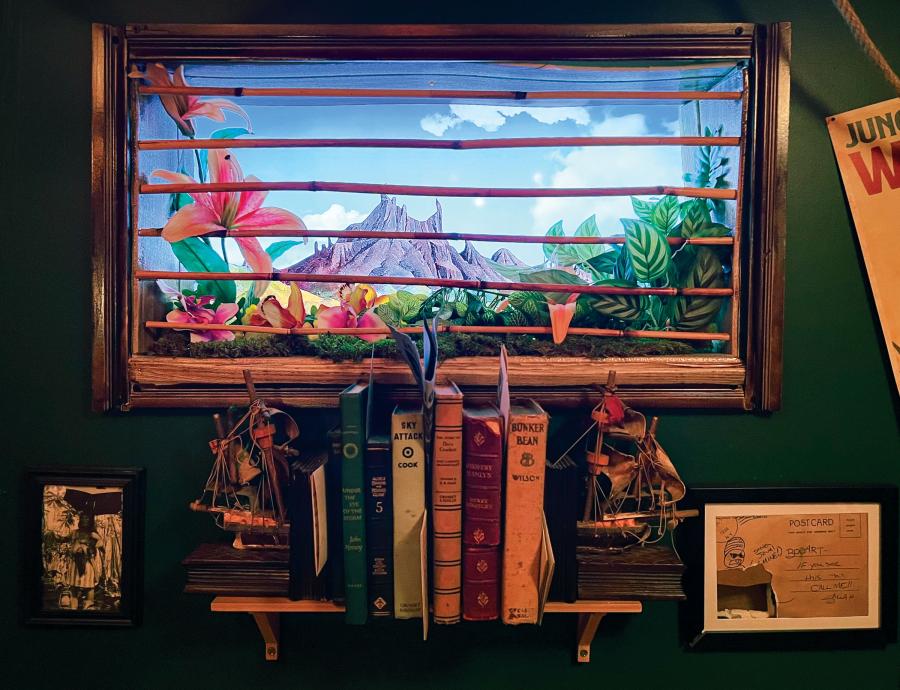 A replica of a tropical window overlooking a volcano scenery