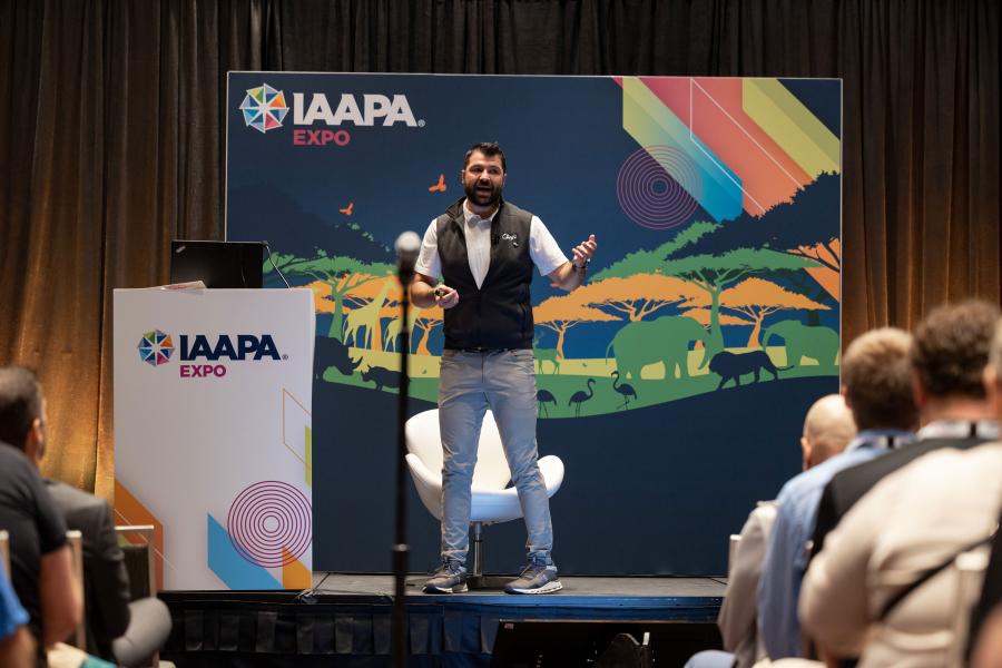 CAVU Designwerks president Mark Stepanian is front-and-center on stage giving his presentation on risk assessment at IAAPA Expo 2023