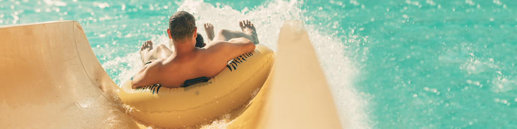 Man going down a waterslide