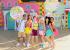 Um grupo de artistas em trajes de praia de verão posam para uma imagem promocional da Merlin Entertainments