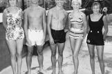 Young Tim O'Brien and friends pose in swimsuits 