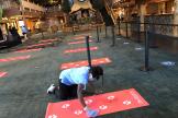 A woman cleans a yoga mat at Great Wolf Lodge